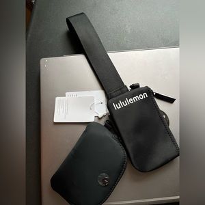 brand new black lululemon wristlet
